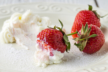fresh strawberry with whipped cream, close view