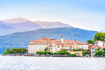 Fototapeta premium Isola Bella - fisherman island in Maggiore lake with mountains in the background, Borromean Islands (Isole Borromee), Stresa, Piedmont, Northern Italy - travel destination in Europe.