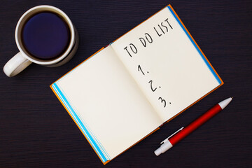 Paper notepad with task list words and numbers handwritten