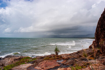 Coastal landscape with cyclone storm clouds on the sky at Port Douglas in Queensland, Australia