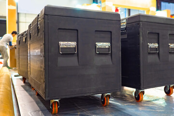 Large cases for musical equipment. Boxes on wheels for concert apparatus. Concept - transportation...