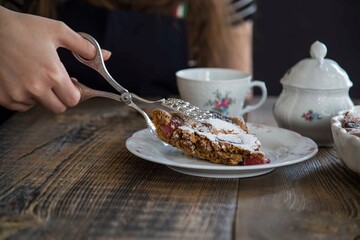 girl drinking cup of tea with brownie. food concept .