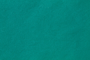 background from turquoise color crepe paper close up