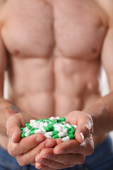 Athlete bodybuilder takes dope in the form of tablets form of pharma rapid progress in muscle...