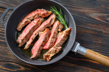 Beef steak in the frying pan