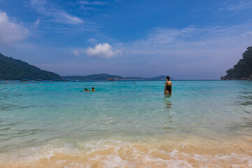 Beautiful tropical beach with white sand and turquoise water on Perhentian Island, Malaysia