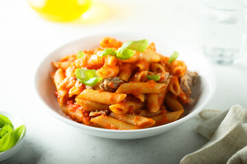 Pasta with chicken, tomato and fresh basil