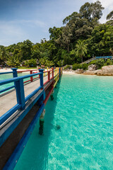 Fototapeta premium Beautiful tropical beach with white sand and turquoise water on Perhentian Island, Malaysia
