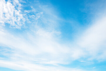 Beautiful white clouds with blue sky.Color shade gradient from white to blue for background wallpaper.