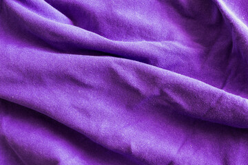 Fototapeta na wymiar wrinkled violet cotton material. texture or background