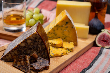 Irish brown porter cheese, blue cheese and tasting glass of single pot still whiskey from Ireland