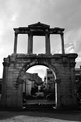 Front view of Hadrian's Arch in black and white
