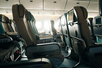 Interior of transcontinental aircraft with empty seats