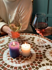 two glasses of champagne and candles