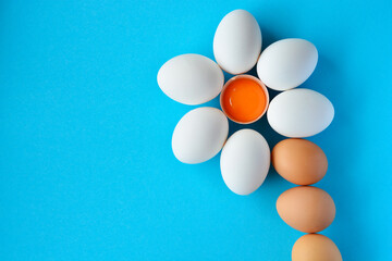 raw chicken eggs in the shape of a palm or flower