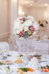 wedding table setting and decorated with flowers 