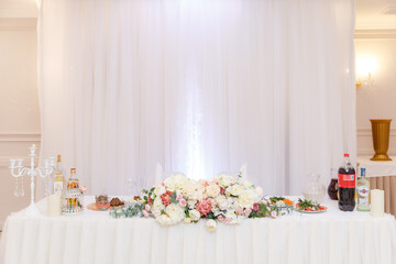 wedding table setting and decorated with flowers 