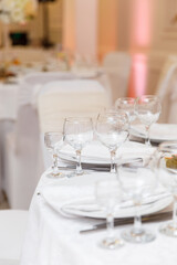 wedding table setting and decorated with flowers 