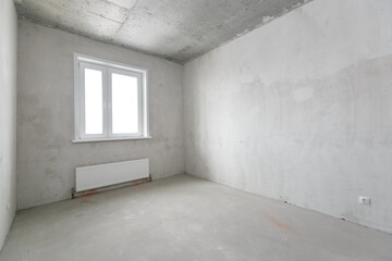 interior of the apartment without decoration in gray colors
