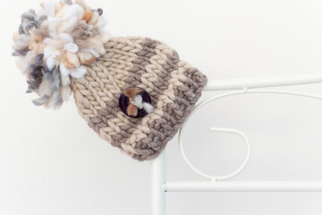 Baby hat in nursery gender neutral colours 