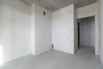interior of the apartment without decoration in gray colors