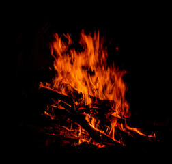 Bonfire. Hot fire against the black night sky.