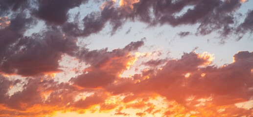 Beautiful bright sunset sky. Dramatic colorful clouds after sunset. Nature backgrounds.Beautiful bright sunset sky. Dramatic colorful clouds after sunset. Nature backgrounds.