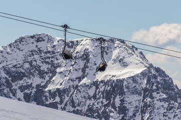 Dolomites Alps mountains in spring with cable car in Italy, Madonna di Campiglio TN