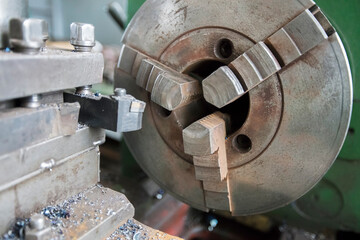 Lathe head with cutters.