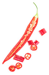 Half of red chilli pepper with slices isolated on a white background, top view.