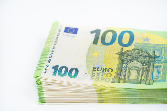 A pack of notes 100 hundred euros. European currency. On white background. Part of a batch of money. Blank for designers.