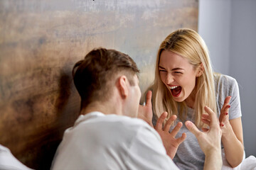 relationship of married couple is undergoing a crisis, they are quarreling, sort things out and scream. they are dissatisfied with each other