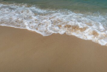 Fototapeta na wymiar Sea waves on the sand beach. sea concept.