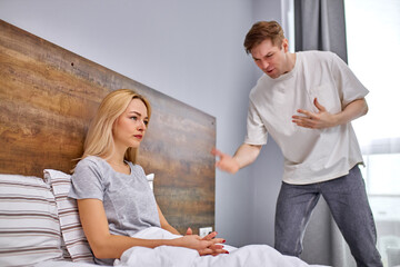 Obraz premium wife is offended by her husband, she is tired of her husband's tantrums. beautiful caucasian couple have problems in their relationships