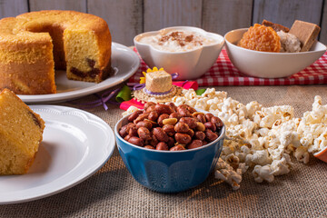 June party. Typical sweets from festa junina. Cornmeal cake, popcorn, hominy, paçoca, cocada, pumpkin jam, and  featured salty peanuts. 