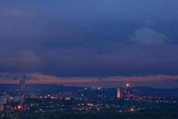 Fototapeta na wymiar Evening industrial city in eastern Europe
