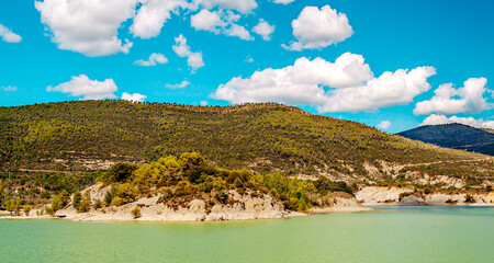 Fototapeta na wymiar Lake in the mountains of the Pyrenees in a sunny day in the north of Spain
