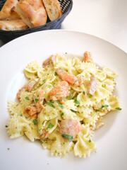 tasty pasta with salmon on a the table