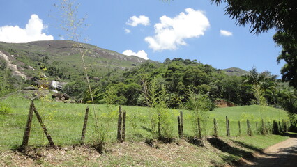 Fototapeta na wymiar mountain landscape with trees and clouds petropolis rio de janeiro rj brasil brazil