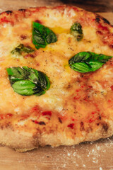 Stock photo of a delicious cheese pizza with basil leaves. Neapolitan pizza