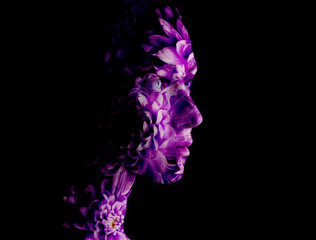 Double exposure of young woman and flowers.