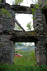 Fototapeta na wymiar An old and overgrown remains of a castle, Ireland
