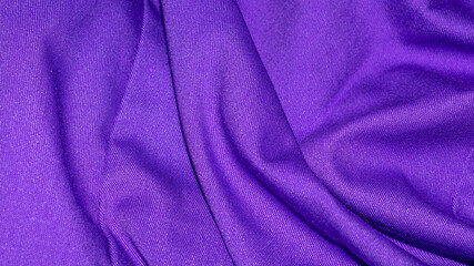 creased purple material texture or background.