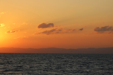 Sunset sky from a ship in ocean. 