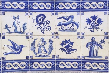 Traditional portuguese azulejo tiles with blue, turquoise and white decoration