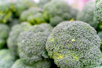 The view of supermarket stall full of fresh green cauliflower vegetables