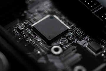 modern black computer chips on an mainboard