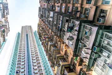 Fototapeta premium The popular between tourists place called Montane Mansion near to Tai Koo in Hong Kong. Overcrowded old retro building