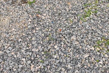 Background texture of rubble stones rubble grey brown