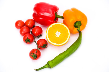 Variety of colorful red, green, yellow paprika bell peppers, tomatoes Healthy eating food